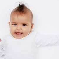 baby girl with spunky hair style